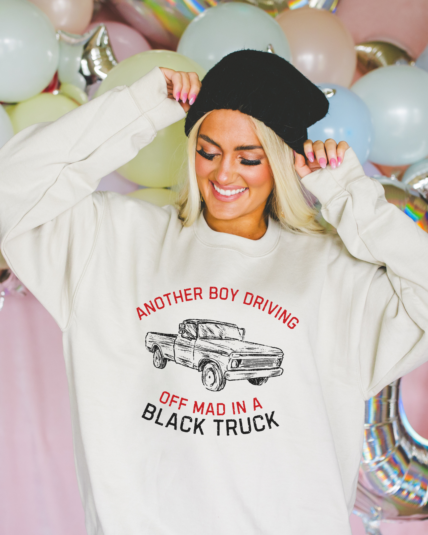 Driving Off Mad in a Black Truck Sweatshirt